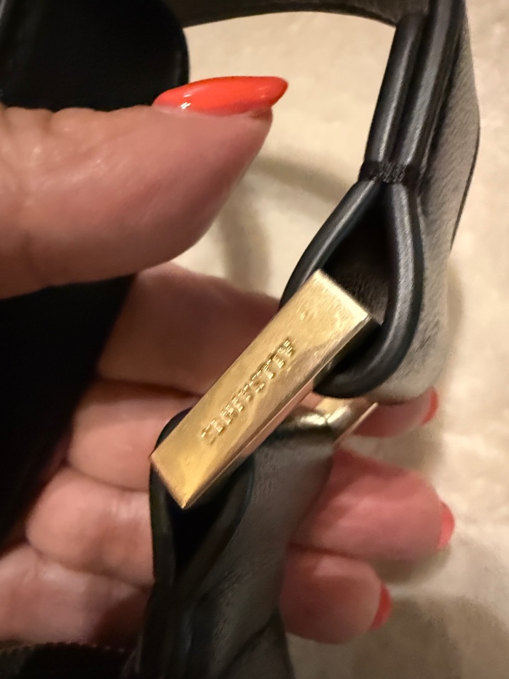 AllSaints Black Crossbody Bag with Gold Grommet Detail - Picture 2 of 4